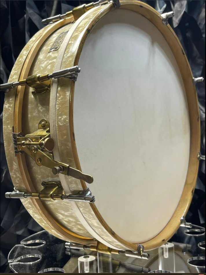 Jedson De Luxe snare drum throw-off side, showing the brass snare release mechanism and calfskin batter head