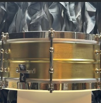 Restored 1930s Leedy 14x5 brass snare drum, side profile, satin brass shell with nickel-plated tube lugs and hoops