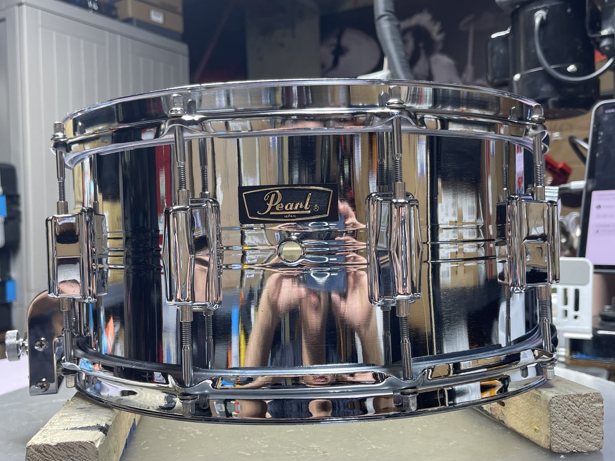 Pearl chrome-shell snare drum with high-gloss polished finish
