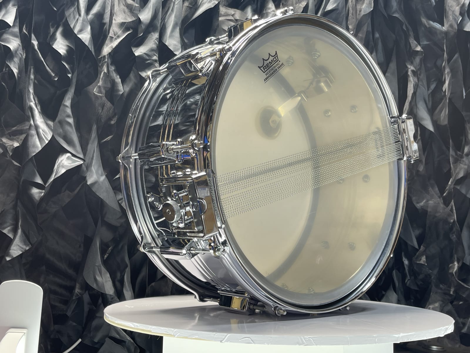 Pearl Jupiter snare, angled view of the snare-side head, wires, and strainer